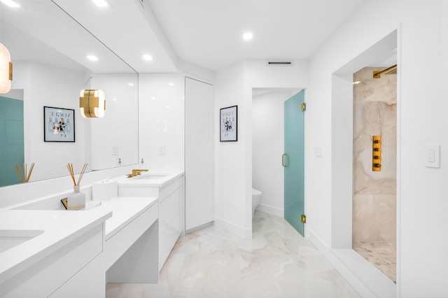 bathroom with double vanity, recessed lighting, marble finish floor, and a marble finish shower