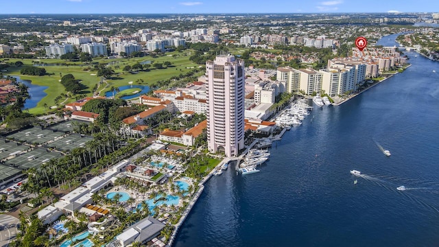 birds eye view of property featuring a view of city and a water view