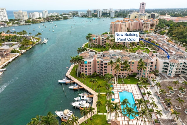 bird's eye view with a city view and a water view