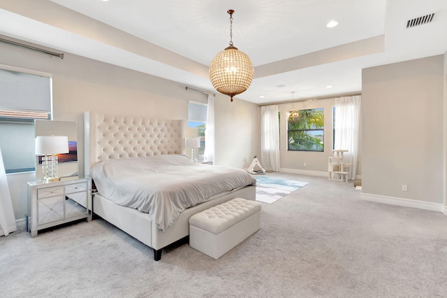 carpeted bedroom with visible vents, recessed lighting, baseboards, and a chandelier