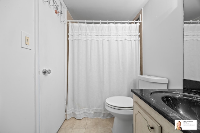 137 Golden Isles Dr Unit 806, Hallandale Beach, FL 33009 - full bathroom featuring vanity, tile patterned flooring, toilet, and curtained shower