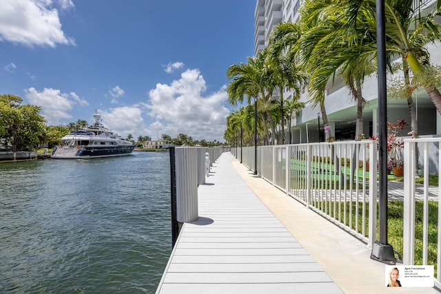 137 Golden Isles Dr Unit 806, Hallandale Beach, FL 33009 - dock with a water view and fence