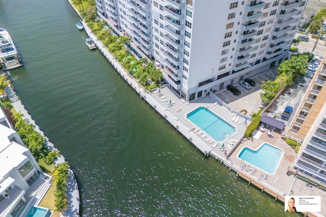 137 Golden Isles Dr Unit 806, Hallandale Beach, FL 33009 - aerial view of a pool area, apartment complex, and a large body of water