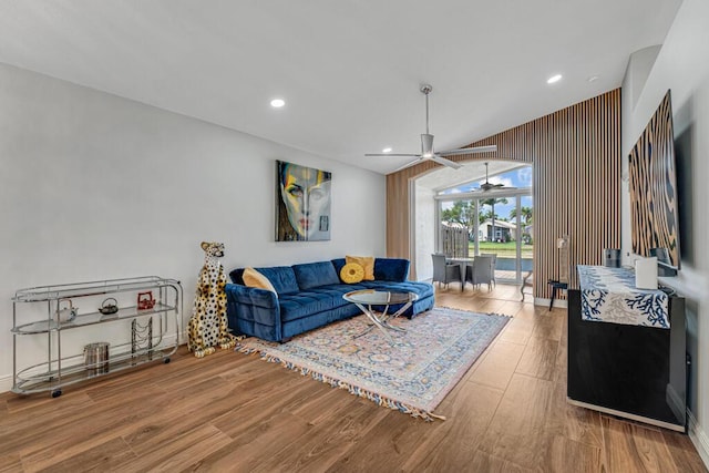 living room with recessed lighting, a ceiling fan, and wood finished floors