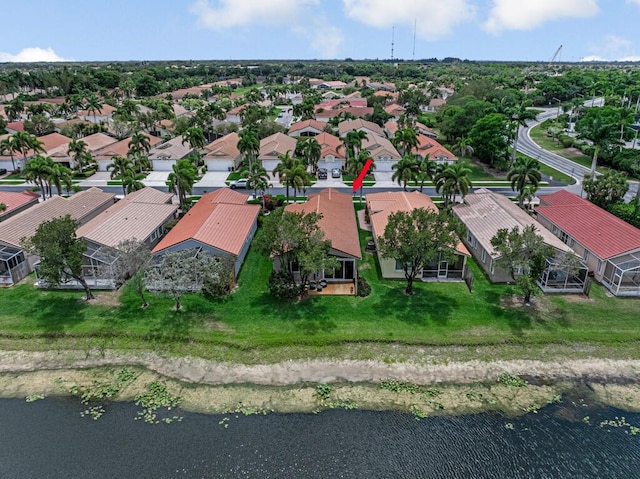aerial view featuring a water view and a residential view