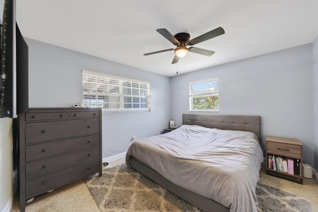 2136 W Carrol Cir, West Palm Beach, FL 33415 - bedroom featuring carpet floors, baseboards, and ceiling fan