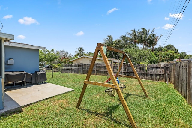 2136 W Carrol Cir, West Palm Beach, FL 33415 - view of yard with a patio area and a playground