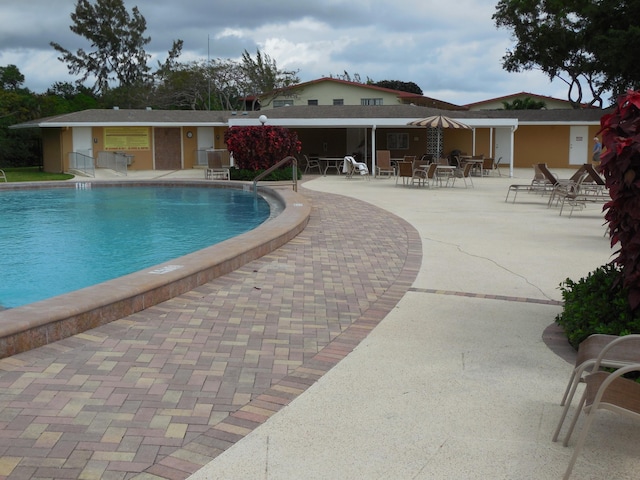 community pool featuring a patio
