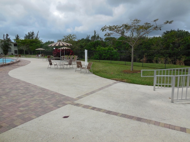 view of patio / terrace featuring a community pool