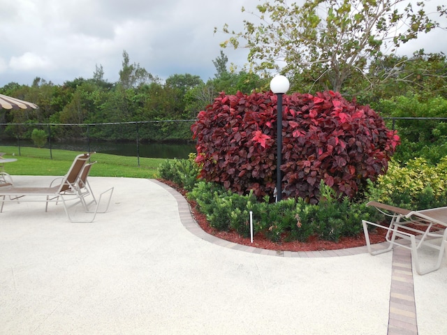 view of patio featuring a forest view