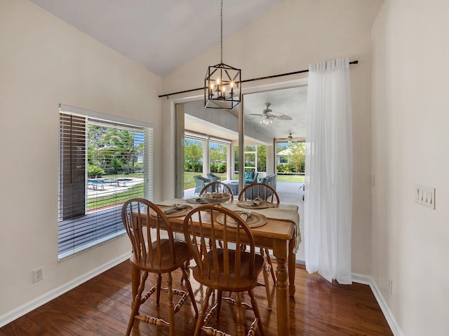 8465 Mandarin Blvd, Loxahatchee, FL 33470 - dining room with baseboards, ceiling fan with notable chandelier, lofted ceiling, and wood finished floors