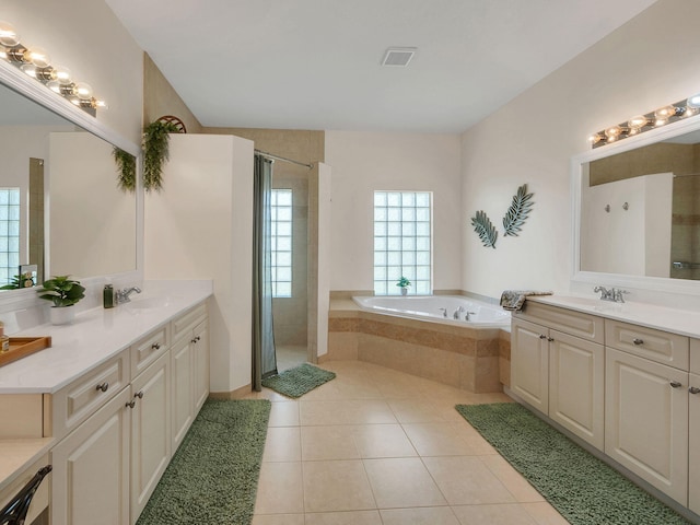 8465 Mandarin Blvd, Loxahatchee, FL 33470 - bathroom featuring visible vents, a sink, a bath, and a stall shower