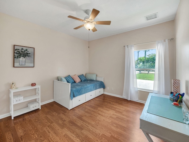 8465 Mandarin Blvd, Loxahatchee, FL 33470 - bedroom with visible vents, baseboards, and wood finished floors
