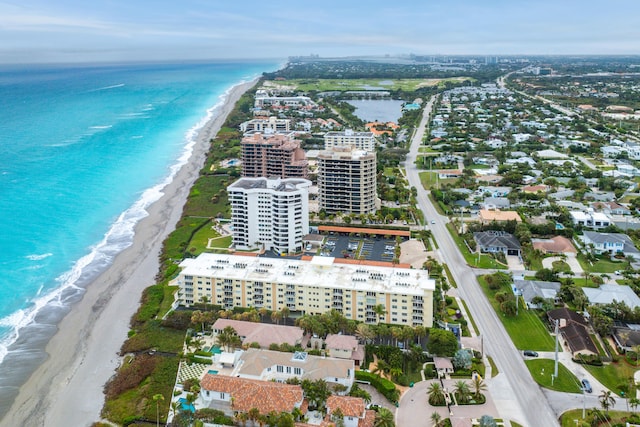 aerial view with a beach view and a water view