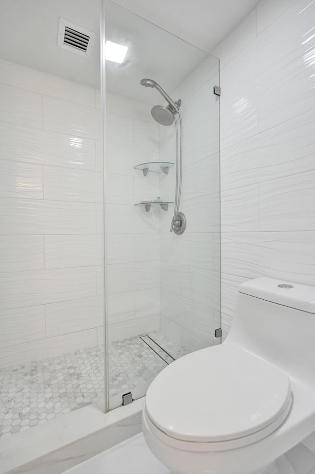 6 Royal Palm Way Unit 506, Boca Raton, FL 33432 - full bath with toilet, visible vents, and tiled shower