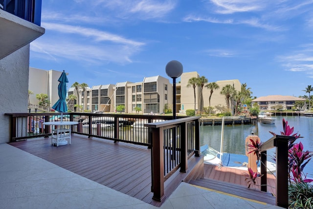 6 Royal Palm Way Unit 506, Boca Raton, FL 33432 - wooden terrace featuring a water view and a residential view