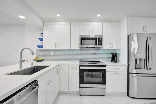 6 Royal Palm Way Unit 506, Boca Raton, FL 33432 - kitchen featuring white cabinets, open shelves, a sink, stainless steel appliances, and recessed lighting