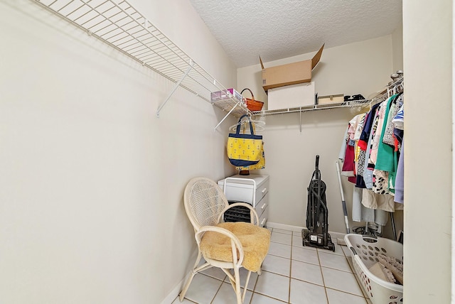 5440 N Ocean Dr Unit 202, Singer Island, FL 33404 - walk in closet featuring light tile patterned floors