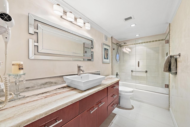 5440 N Ocean Dr Unit 202, Singer Island, FL 33404 - bathroom with visible vents, vanity, combined bath / shower with glass door, toilet, and recessed lighting
