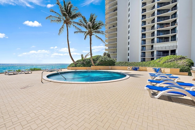 5440 N Ocean Dr Unit 202, Singer Island, FL 33404 - view of pool featuring a swimming pool and a water view