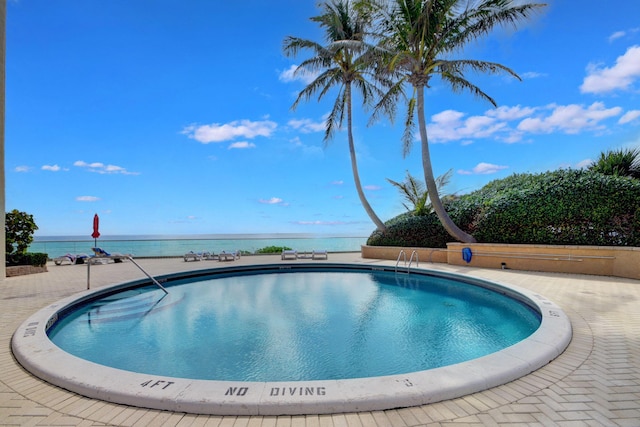5440 N Ocean Dr Unit 202, Singer Island, FL 33404 - pool with a water view