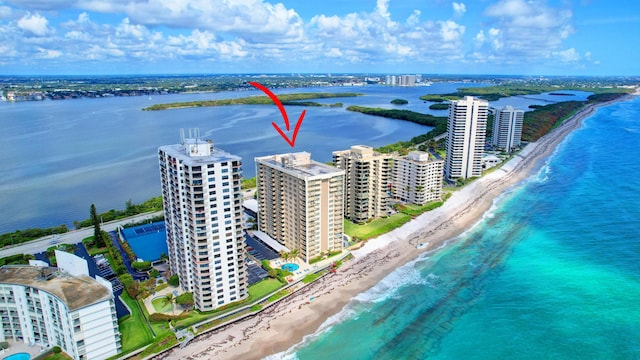 5440 N Ocean Dr Unit 202, Singer Island, FL 33404 - drone / aerial view featuring a water view and a beach view