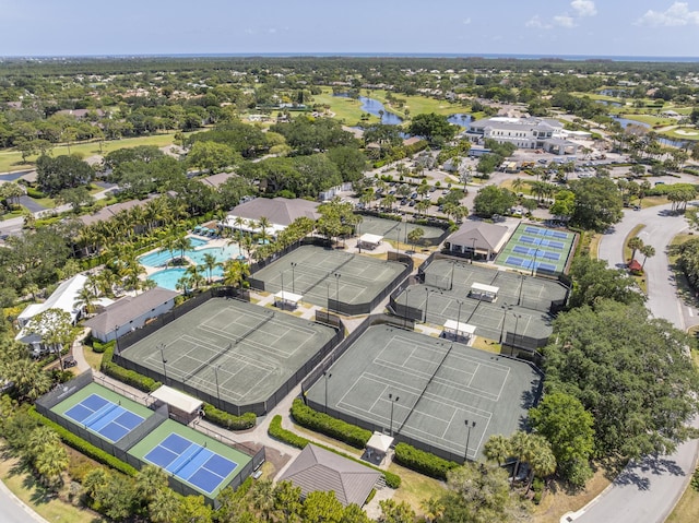 drone / aerial view with a water view and a residential view