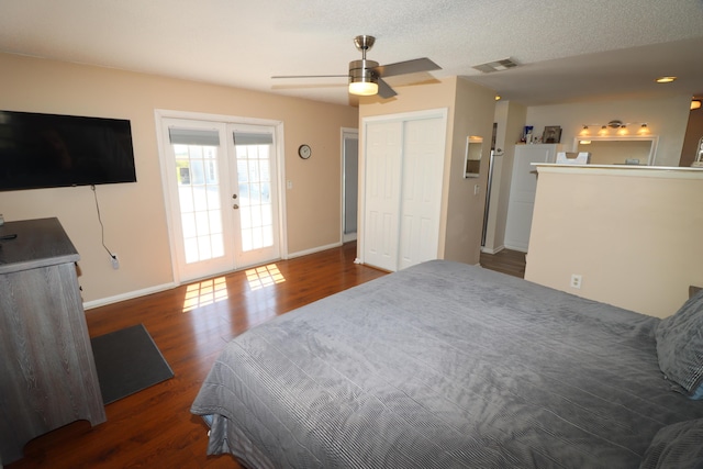 7175 NW 82nd Ct, Okeechobee, FL 34972 - bedroom with visible vents, wood finished floors, and baseboards