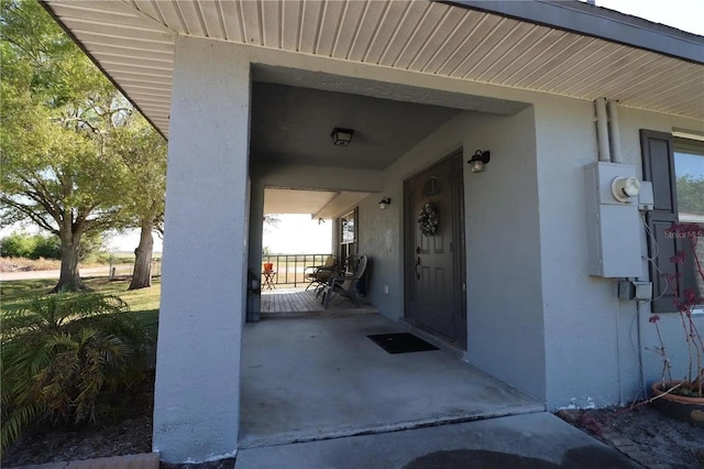 7175 NW 82nd Ct, Okeechobee, FL 34972 - entrance to property with stucco siding