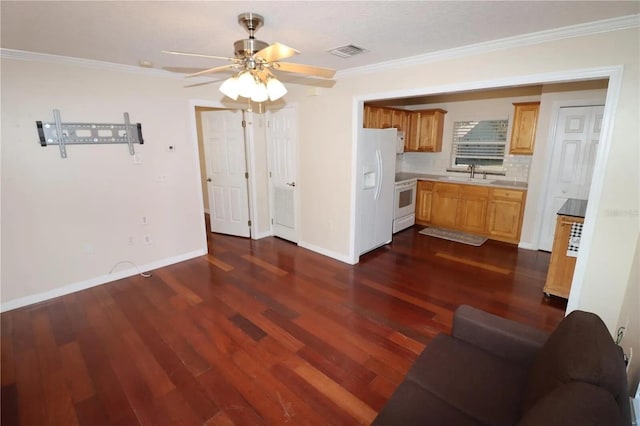 7175 NW 82nd Ct, Okeechobee, FL 34972 - kitchen with dark wood finished floors, visible vents, ceiling fan, light countertops, and ornamental molding