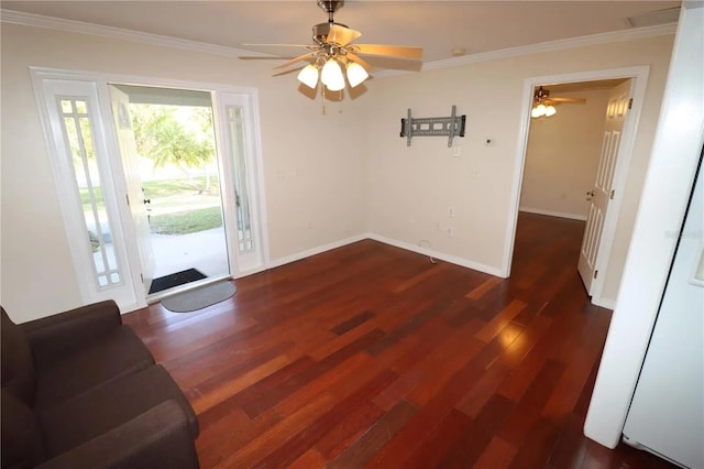 7175 NW 82nd Ct, Okeechobee, FL 34972 - unfurnished dining area featuring crown molding, a wealth of natural light, a ceiling fan, and wood finished floors