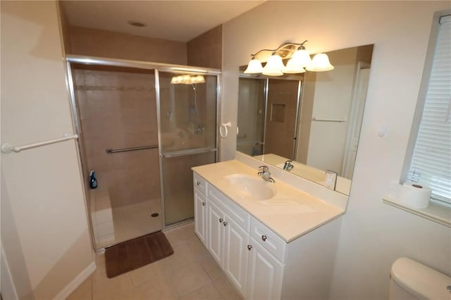 7175 NW 82nd Ct, Okeechobee, FL 34972 - full bathroom with a stall shower, tile patterned flooring, vanity, and toilet