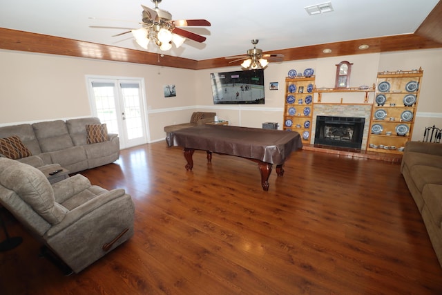 7175 NW 82nd Ct, Okeechobee, FL 34972 - rec room with wood finished floors, visible vents, ceiling fan, billiards, and a fireplace with raised hearth