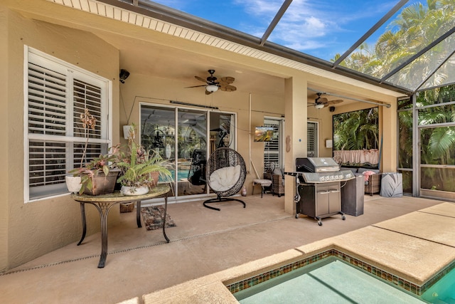 view of patio / terrace with a lanai, ceiling fan, a grill, and an outdoor pool