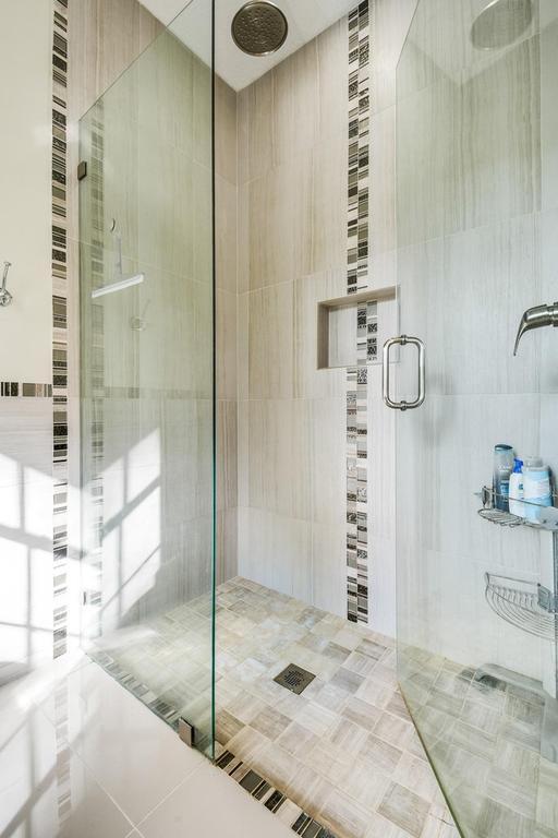 16239 121st Ter N, Jupiter, FL 33478 - bathroom with tile patterned floors and a shower stall