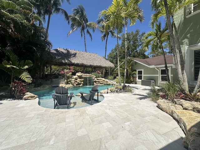 16239 121st Ter N, Jupiter, FL 33478 - outdoor pool with a patio area