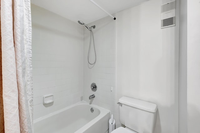 full bathroom featuring visible vents, toilet, and shower / tub combo