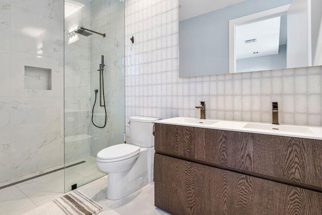 914 Palm Trl, Delray Beach, FL 33483 - bathroom with toilet, a marble finish shower, marble finish floor, tile walls, and visible vents