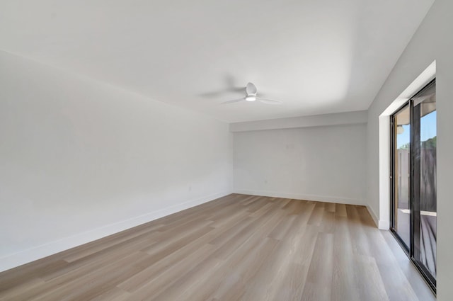 2003 20th Way, West Palm Beach, FL 33407 - spare room with a ceiling fan, light wood-style floors, and baseboards