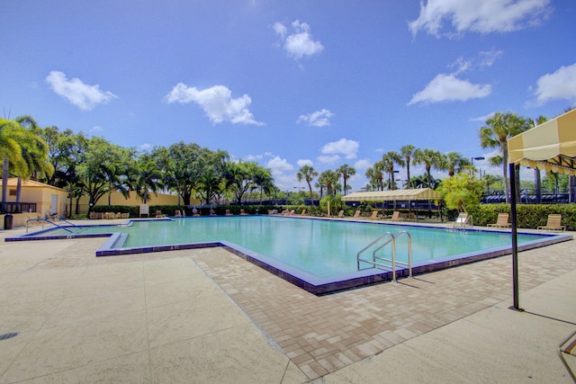 2003 20th Way, West Palm Beach, FL 33407 - community pool featuring a patio area