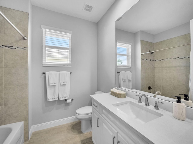 12495 SW Sunrise Lake Ter, Port Saint Lucie, FL 34987 - bathroom with baseboards, toilet, vanity, and wood finished floors