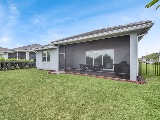 12495 SW Sunrise Lake Ter, Port Saint Lucie, FL 34987 - back of house with stucco siding and a sunroom
