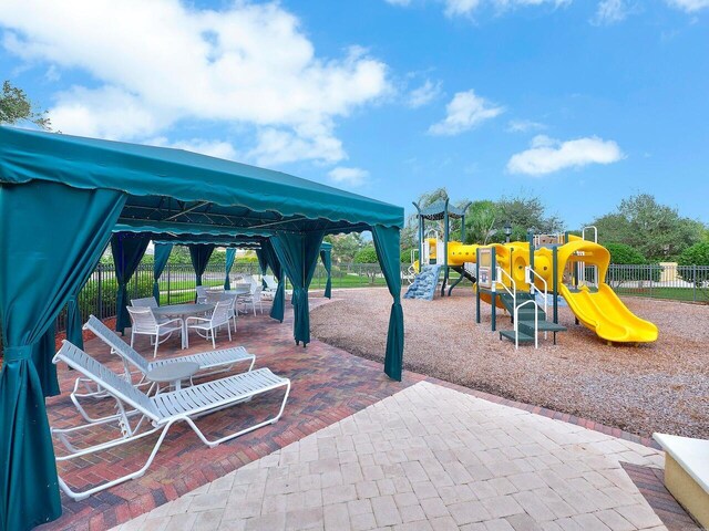 12495 SW Sunrise Lake Ter, Port Saint Lucie, FL 34987 - community play area with a gazebo and fence