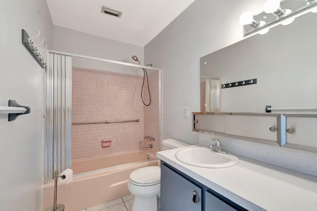 2811 Ashley Dr E Unit E, West Palm Beach, FL 33415 - full bath featuring visible vents, vanity, toilet, tile patterned floors, and  shower combination