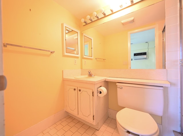 205 Mansfield E, Boca Raton, FL 33434 - full bath featuring baseboards, tile patterned flooring, toilet, and vanity