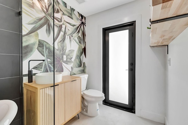 bathroom featuring toilet