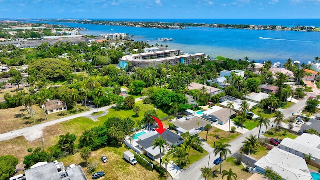 bird's eye view featuring a residential view and a water view