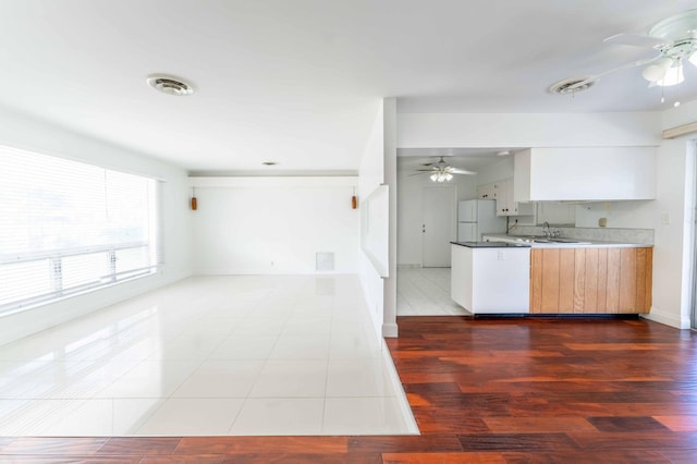 2607 Wiley St, Hollywood, FL 33020 - kitchen featuring baseboards, ceiling fan, freestanding refrigerator, and visible vents