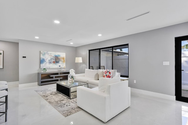 200 SW 12th St, Boca Raton, FL 33432 - living room featuring baseboards and recessed lighting