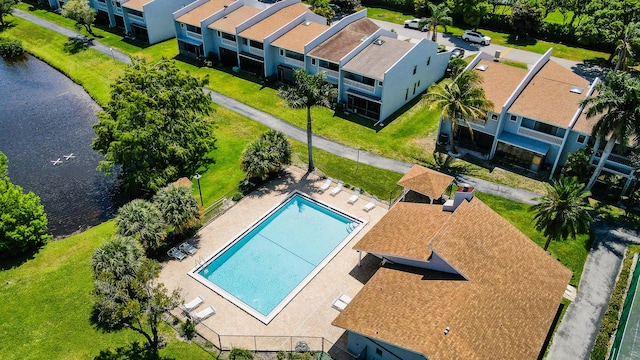 1693 Woodbridge Lakes Cir, West Palm Beach, FL 33406 - drone / aerial view of a pool and a large body of water